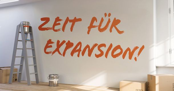 Wand mit Aufschrift: Zeit für Expansion