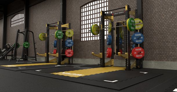 Modern gestalteter, modularer Functional-Training-Bereich mit Rig- und Rack-Systemen von NAOMI FITNESS DESIGN in einem Fitnessstudio.