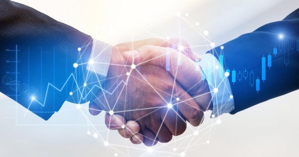 Handschlag mit futuristischen, digitalen Effekten