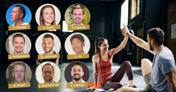 Zwei Fitnessstudiomitglieder beim High-Five