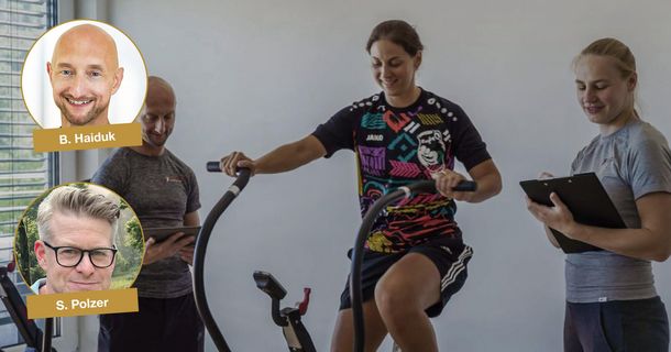 Dr. Björn Haiduk mit Patientin auf einem Indoor-Bike und Trainerin