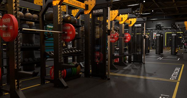 Modern gestalteter, modularer Functional-Training-Bereich mit Rig- und Rack-Systemen von NAOMI FITNESS DESIGN in einem Fitnessstudio.
