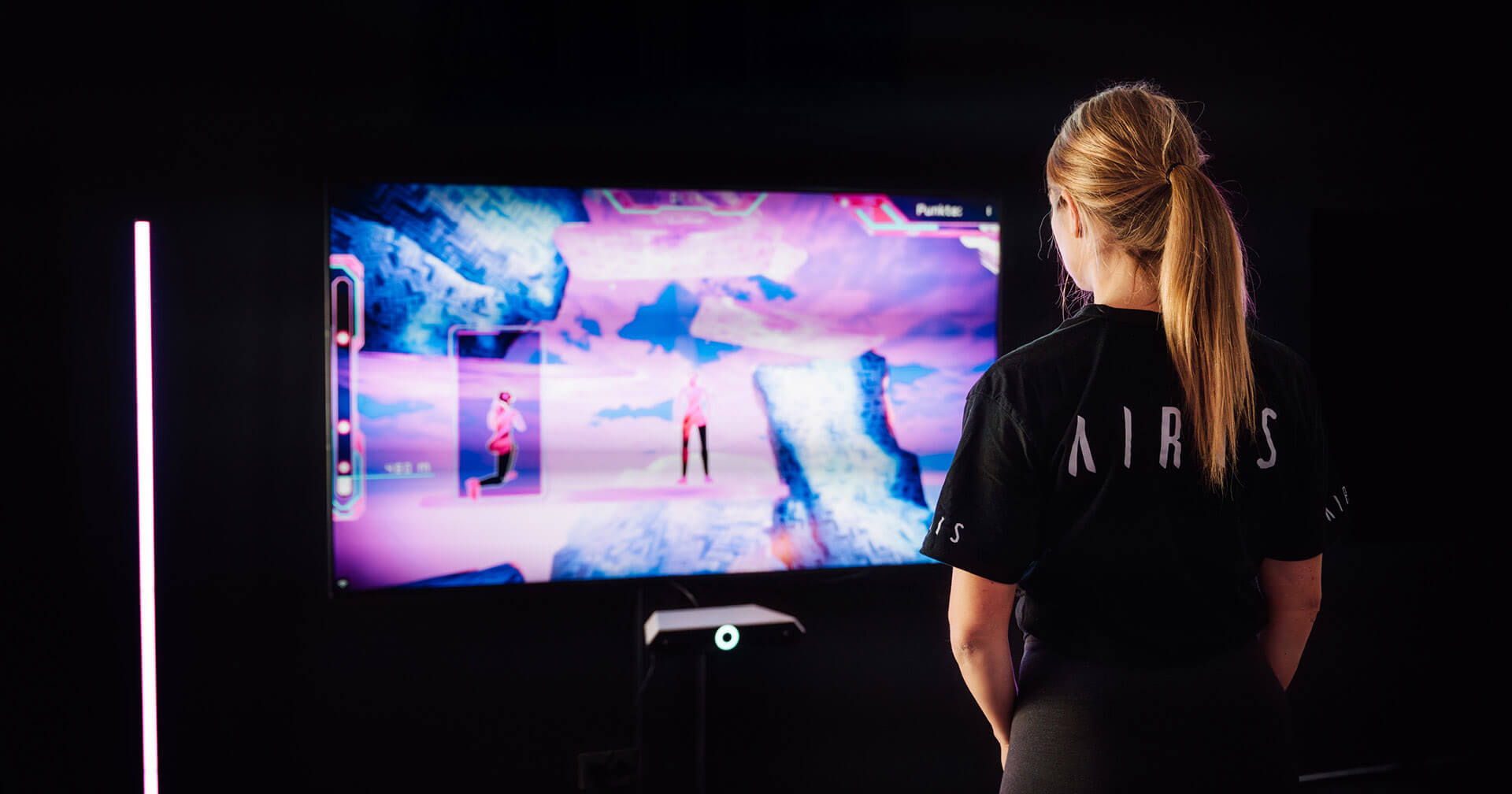 Sportlerin trainiert mit AIRIS Game